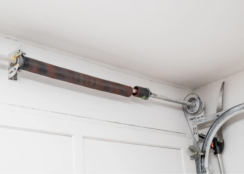Garage door torsion spring mechanism